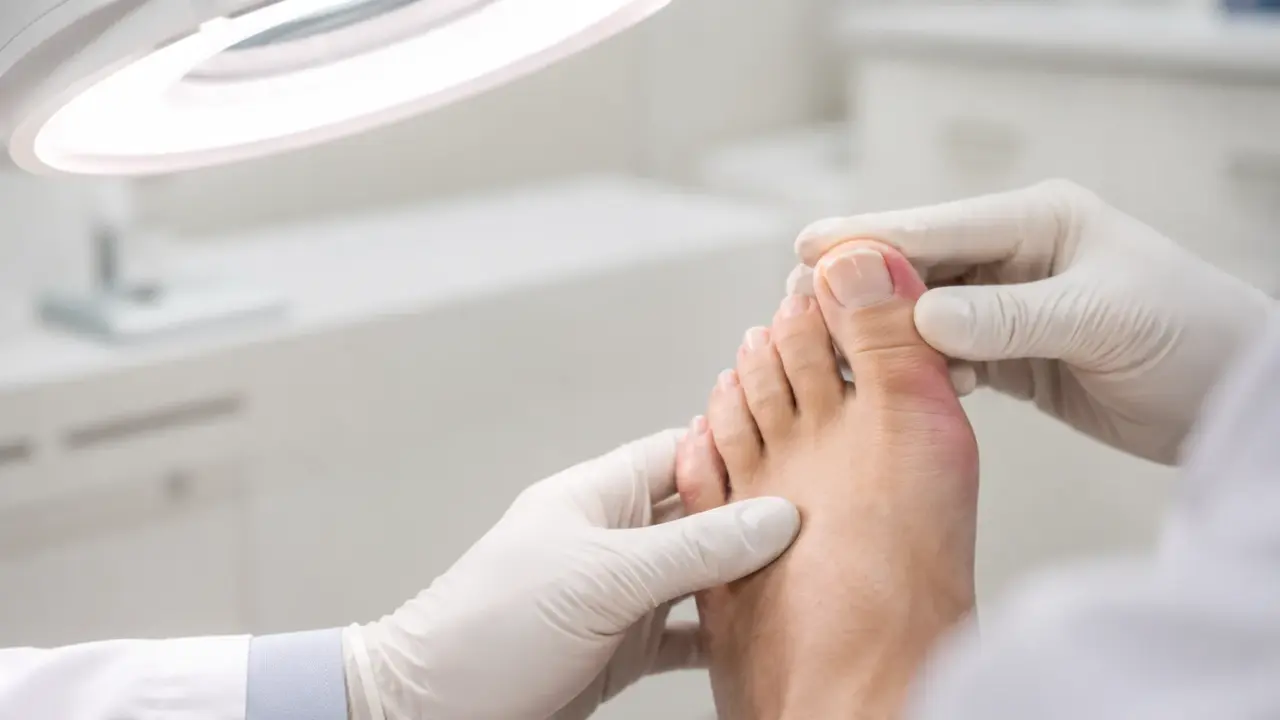 Close-up of a podiatrist examining an ingrown toenail on the big toe